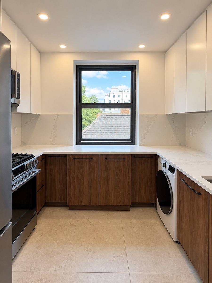 Window wall with stone counter and backsplash